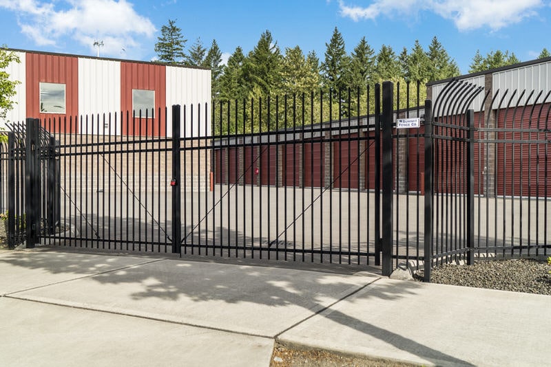 Black wrought iron commercial security fence at Armor Storage in Lacey, WA installed by Summit Fence Co. LLC