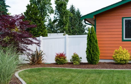 Residential vinyl fence in Olympia, WA installed by Summit Fence Co. LLC