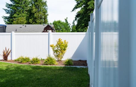 Residential vinyl fence in Olympia, WA installed by Summit Fence Co. LLC